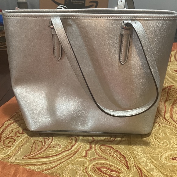 Michael Kors Silver Purse- Divided compartments. Roomie but not overly big! - Picture 9 of 9